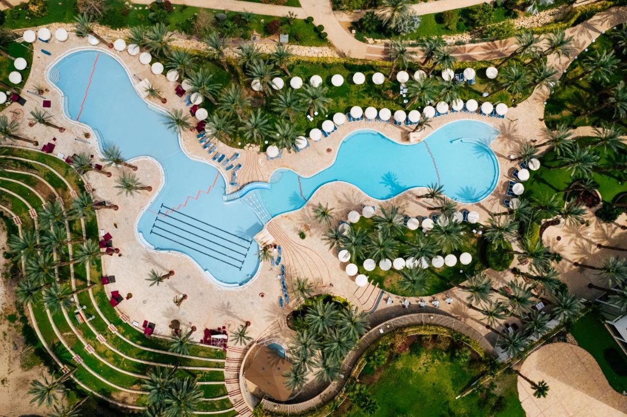 David Dead Sea Resort & Spa Ein Bokek Exterior photo Aerial view of the pool at the Atlantis Paradise Island