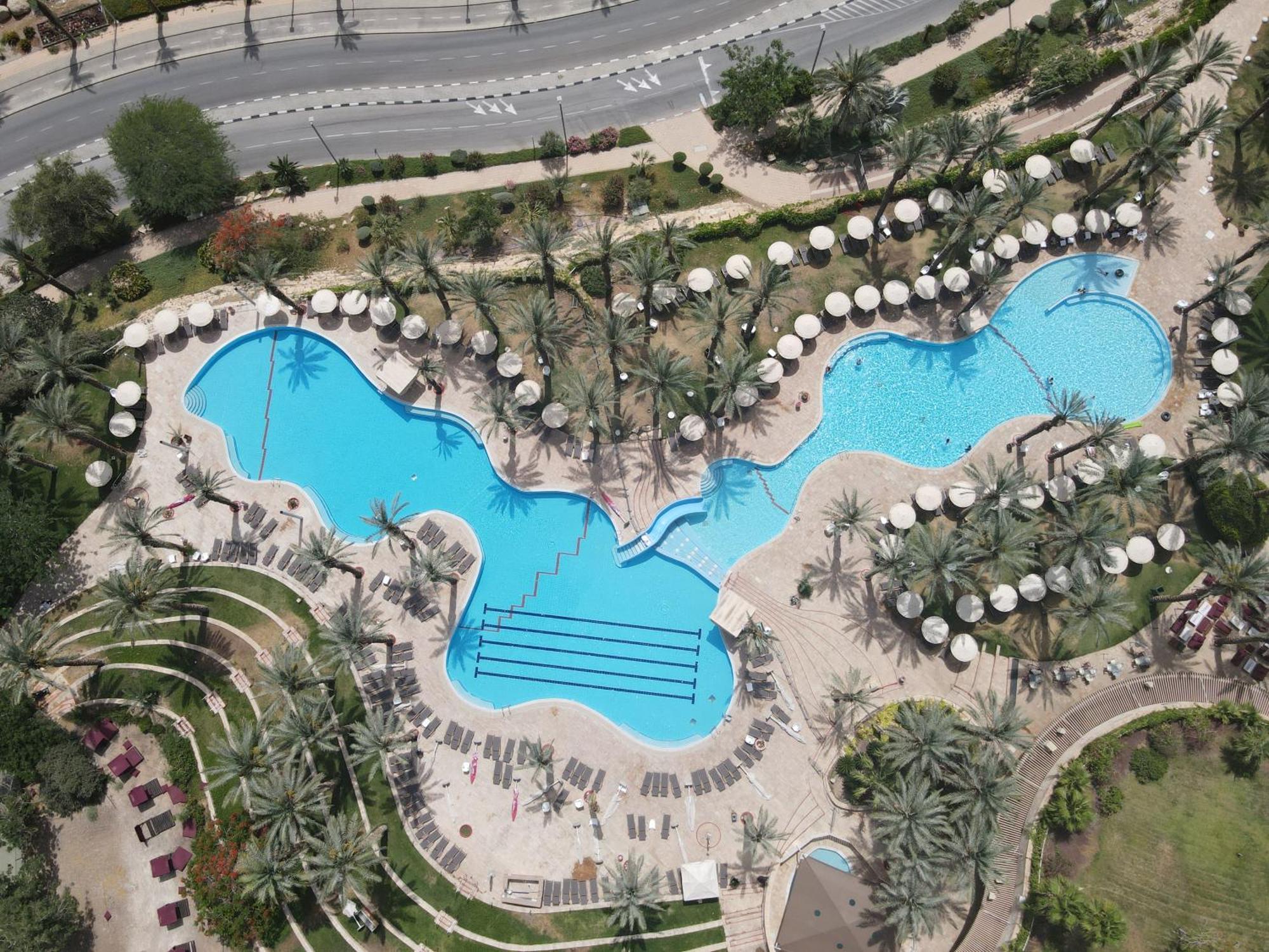 David Dead Sea Resort & Spa Ein Bokek Exterior photo Aerial view of the pool